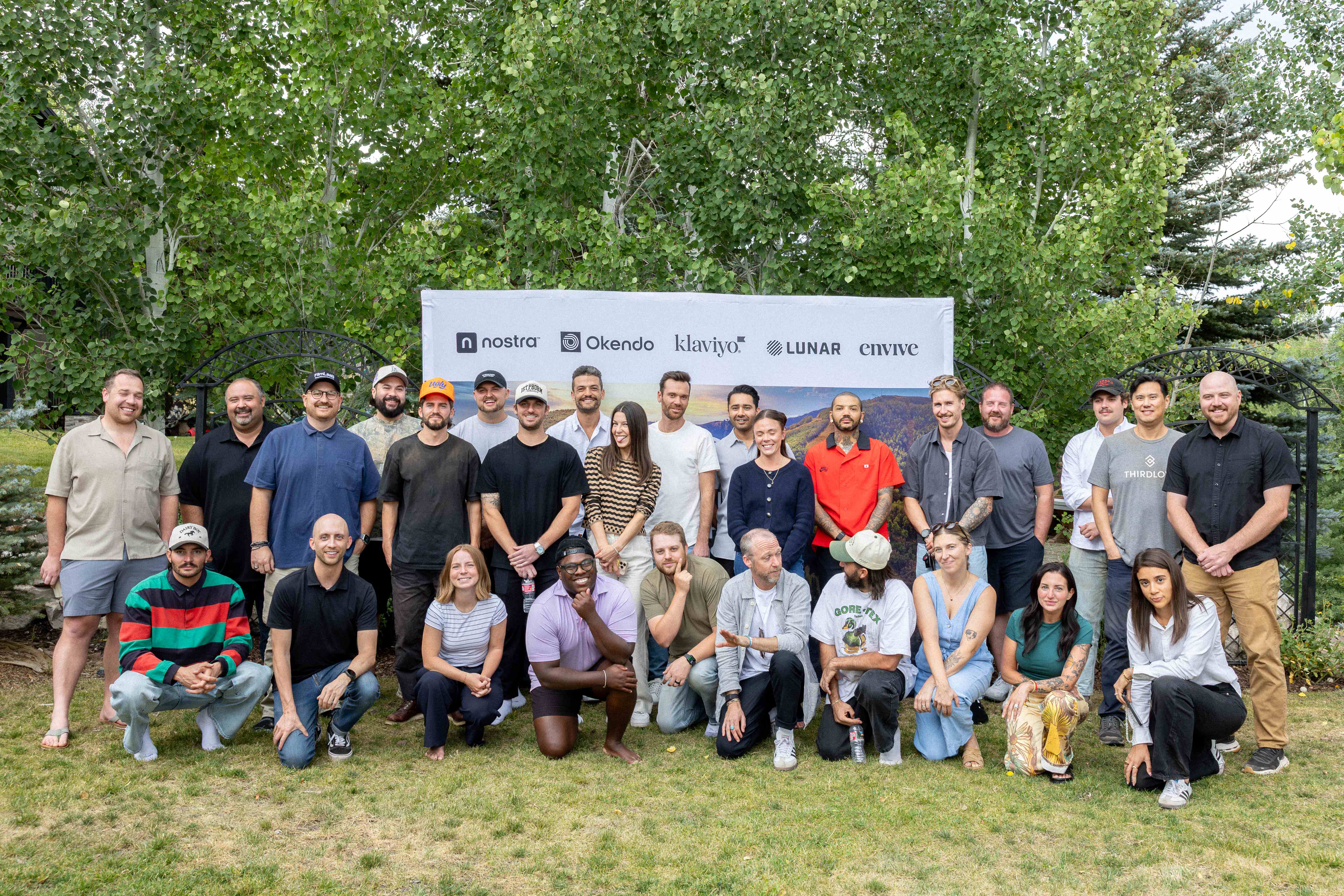 Large group photo of community members at a professional networking event